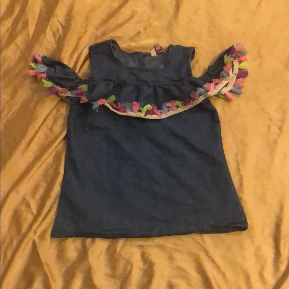 Cold shoulder top with tassels